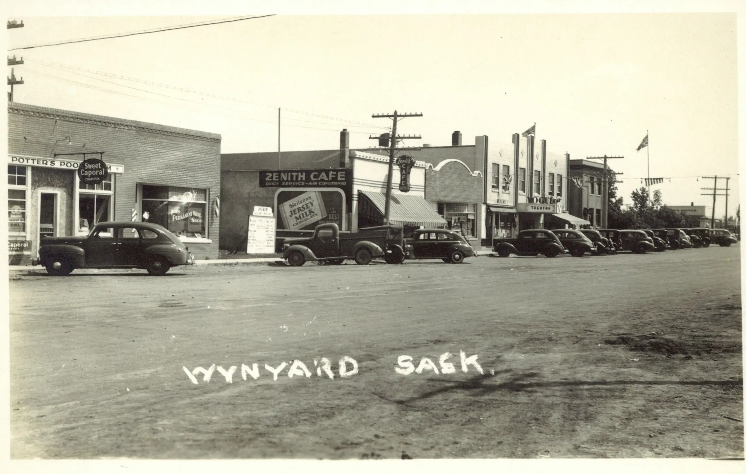 Main Street, Wynyard, with Zenith Cafe and parked cars